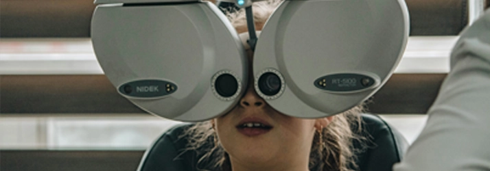 Eye Doctor Laramie WY Eye Exam Young child receiving an eye exam.
